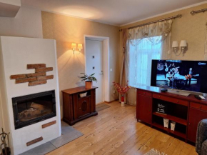 Idyllic apartment in Supilinn with a balcony, private parking and contact-free entrance